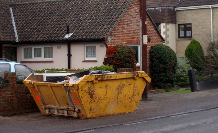 Skip on a pavement in Crawley West Sussex
