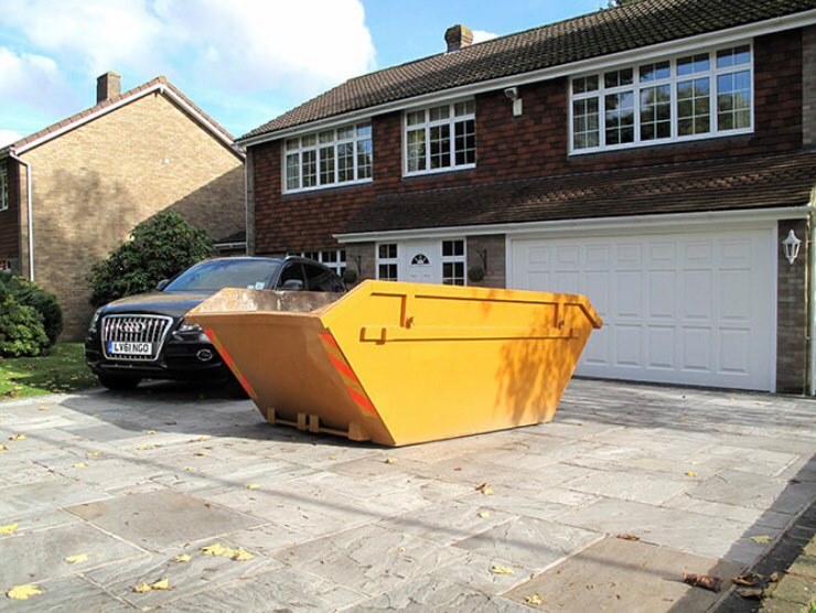 empty large skip on a driveway in Crawley
